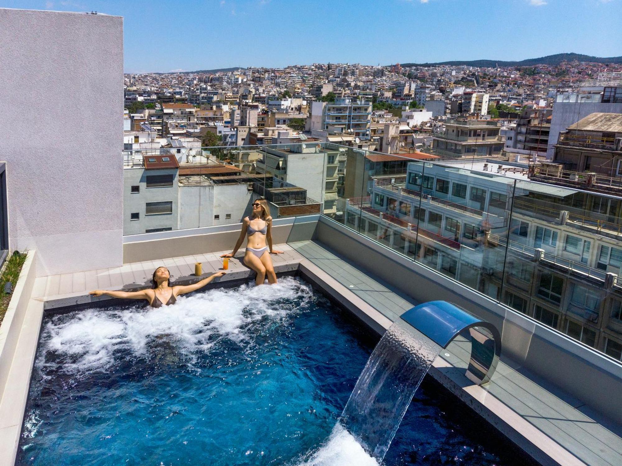 Onoma Hotel Салоники Экстерьер фото Rooftop pool at the Hilton Athens